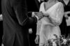 A bridge and groom saying their vows after signing a pre-nuptial agreement